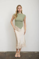 ASYMMETRICAL HEM MOCK NECK SLEEVELESS TOP