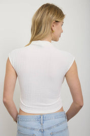 ASYMMETRICAL HEM MOCK NECK SLEEVELESS TOP
